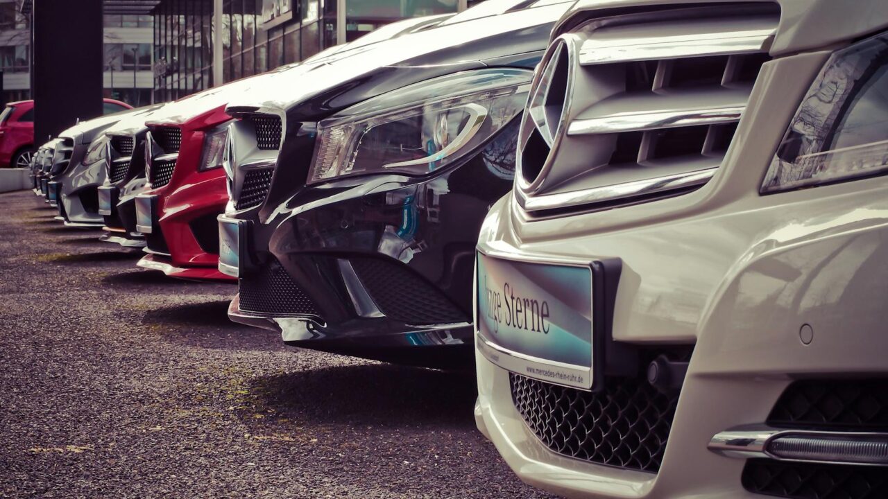 mercedes benz parked in a row